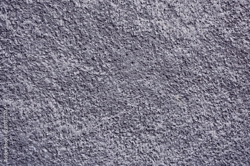Cement plastered stone wall. Texture, design, background.