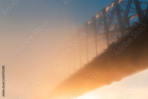 Thick fog over Sydney Harbour Bridge.