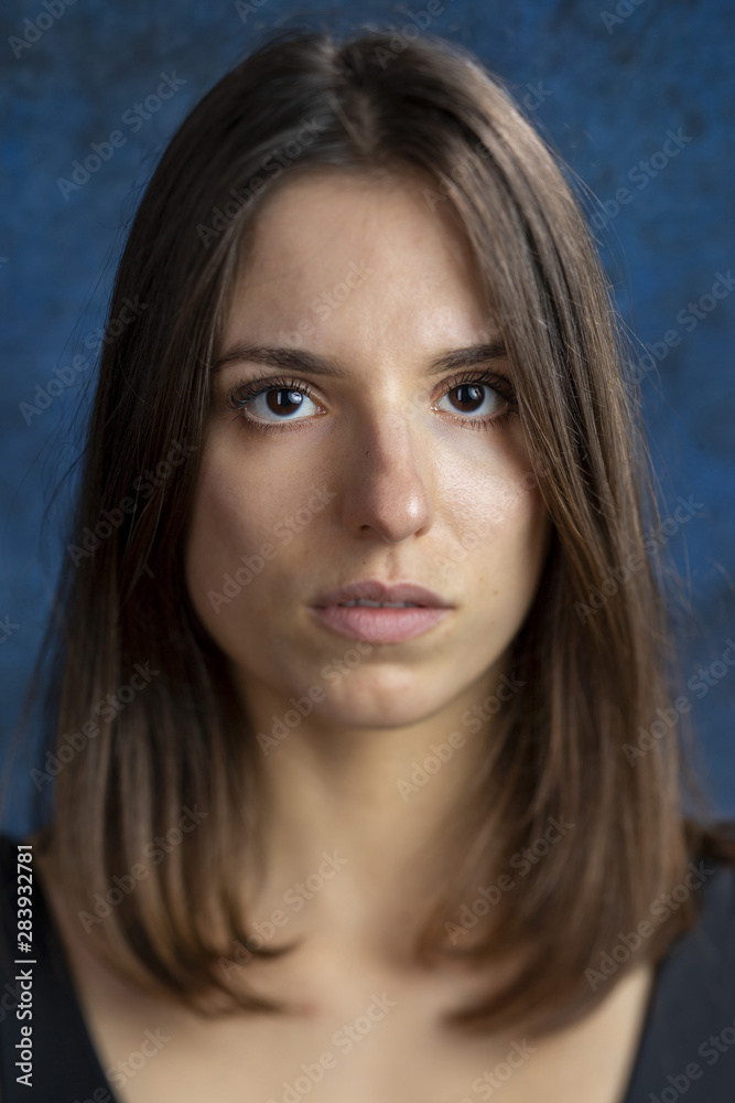 Studio portrait of a young girl showing beautiful eyelashes Studio portrait of a young girl showing beautiful eyelashes