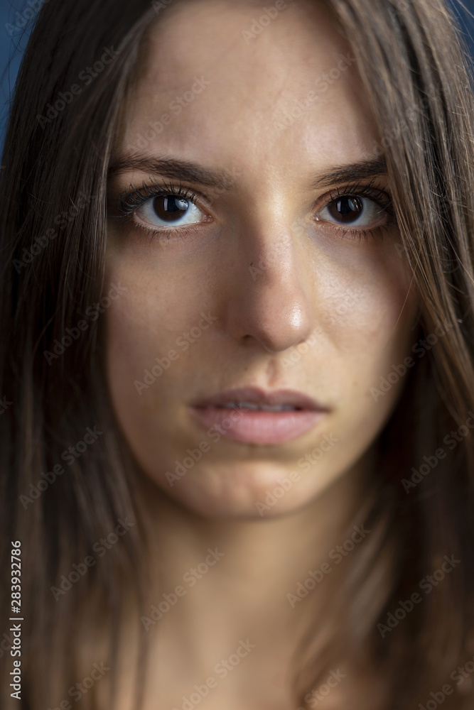 Studio portrait of a young girl showing beautiful eyelashes using artistic blur Studio portrait of a young girl showing beautiful eyelashes using artistic blur