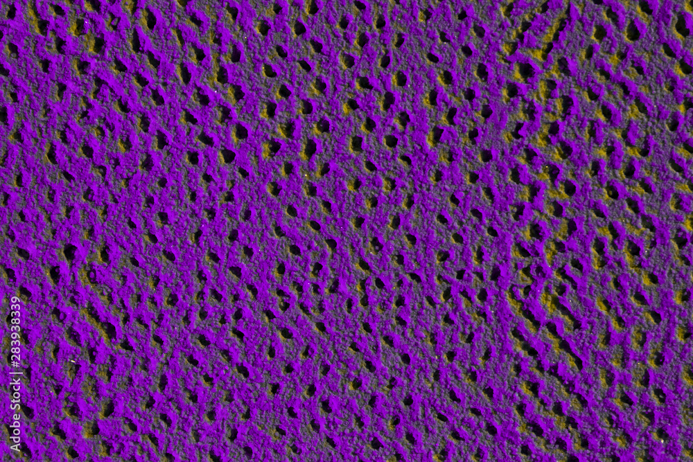 Violet sand with small opening holes Violet sand with small opening holes