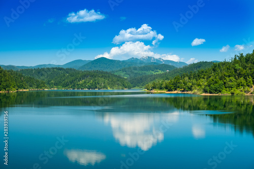 Croatia, beautiful lake in Gorski kotar, Lokve, Risnjak mountain in background, reflection in watter
