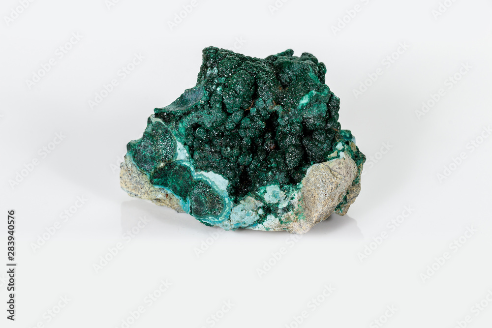 Macro mineral stone Malachite against white background