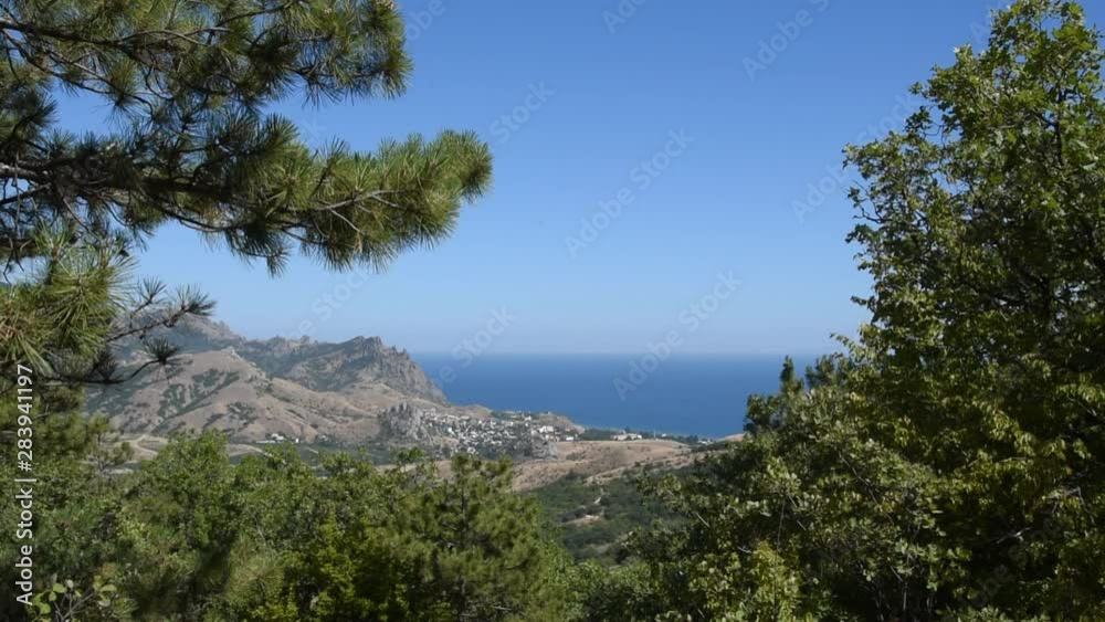 Beautiful seascape in Crimea (Coast of the Black Sea) with pine and forest
