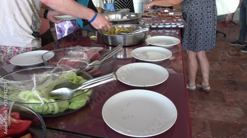 Mugla, Turkey - 16th of July 2019: 4K At the Safak recreation facility - Viewing breakfast buffet table with olives and cheese on it photo