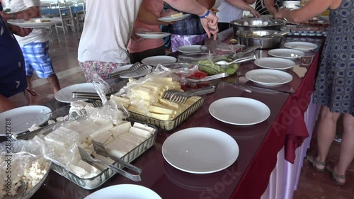 Mugla, Turkey - 16th of July 2019: 4K At the Safak recreation facility - Viewing breakfast buffet table with olives and cheese on it photo