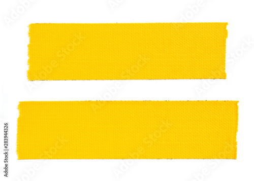 Two pieces of yellow cloth gaffer tape isolated on white background.