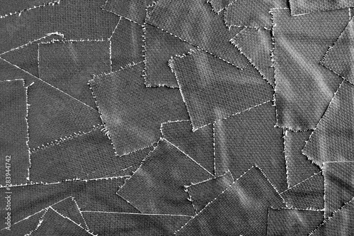 Closeup ripped pieces of  black matte cloth gaffer tape texture background. photo