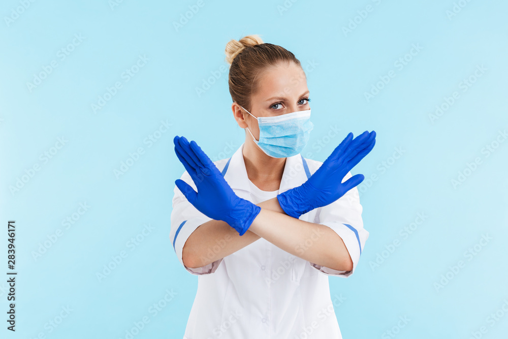 Beautiful blonde woman doctor wearing uniform standing Beautiful blonde woman doctor wearing uniform standing