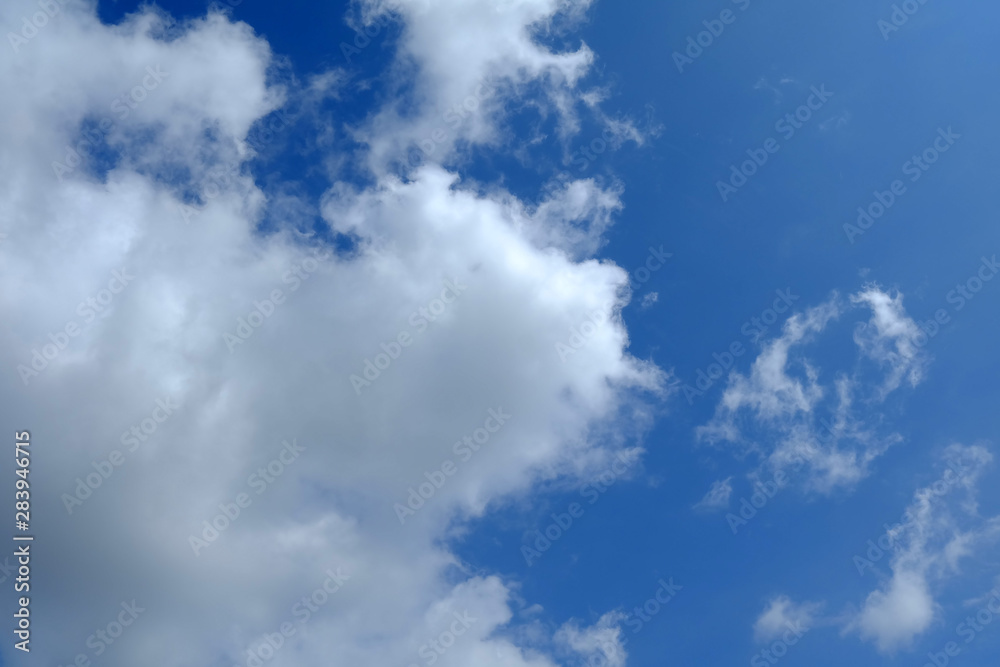 Obraz premium White Clouds with Beautiful Blue Sky Background.
