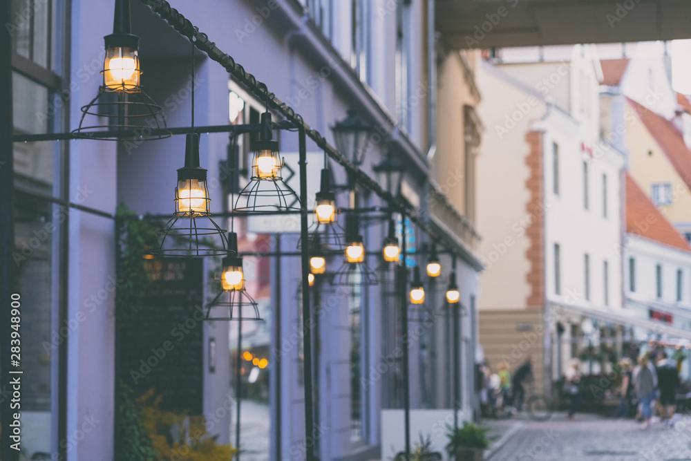 Fototapeta premium Street summer life of the evening city of Riga