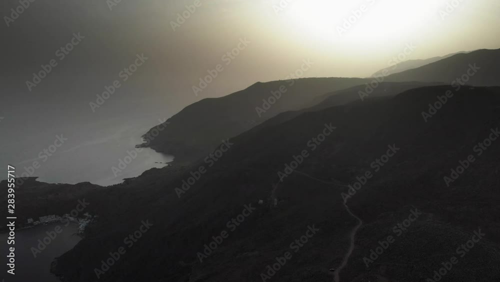Mountain and seascape during sunset Mountain and seascape during sunset