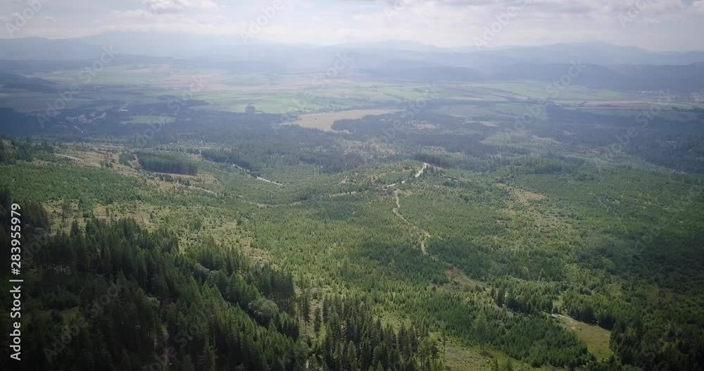 View to the horizon. Mountains and green forest. Sunny day View to the horizon. Mountains and green forest. Sunny day
