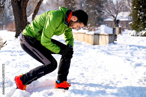 Athlete man training at snow