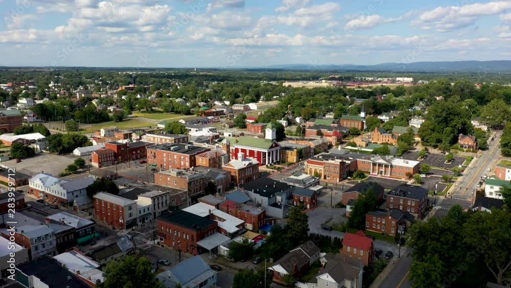 Low aerial orbit to the left with county courthouse centered in Charles Town, West Virginia. Low aerial orbit to the left with county courthouse centered in Charles Town, West Virginia.