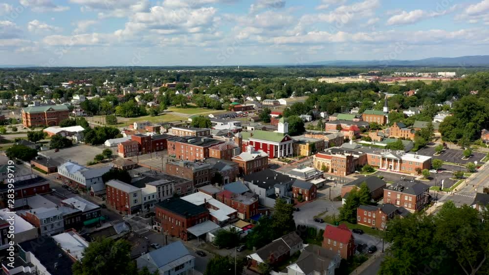 Low aerial orbit to the right with county courthouse centered in Charles Town, West Virginia. Low aerial orbit to the right with county courthouse centered in Charles Town, West Virginia.