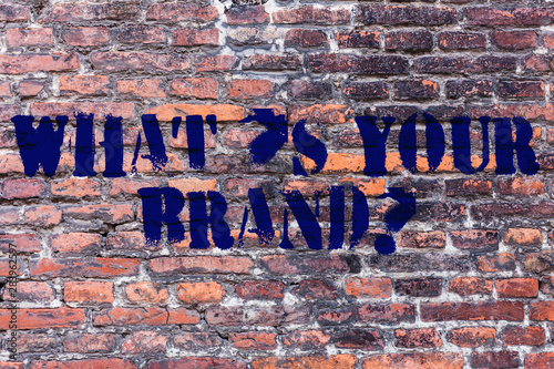 Handwriting text What S Your Brand Question. Conceptual photo asking about product logo does or what you communicate Brick Wall art like Graffiti motivational call written on the wall photo