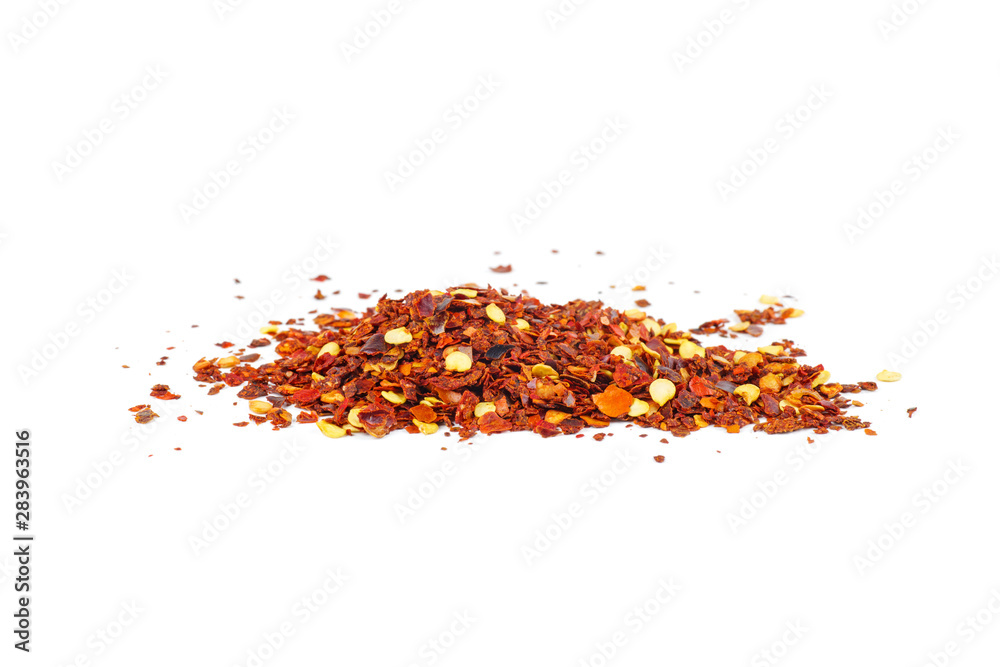 Grinded chili peppers isolated on white background Grinded chili peppers isolated on white background