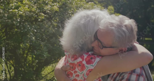 Wallpaper Mural Senior man and woman hugging Torontodigital.ca