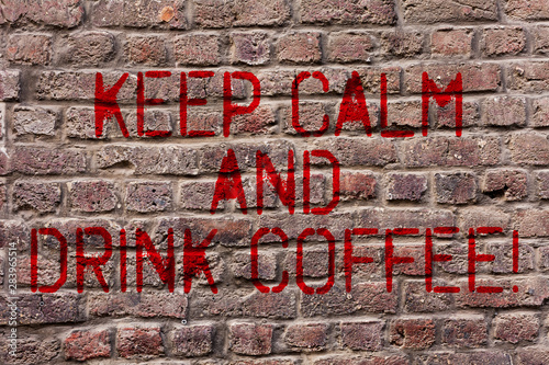 Writing note showing Keep Calm And Drink Coffee. Business concept for encourage demonstrating to enjoy caffeine drink and relax Brick Wall art like Graffiti motivational call written on the wall