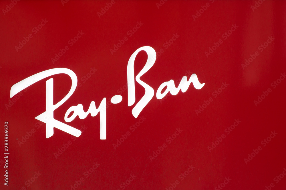 Ray-Ban logo on store in New York, USA. It is a brand of sunglasses and  eyeglasses founded in 1937 by American company Bausch and Lomb. Stock Photo  | Adobe Stock