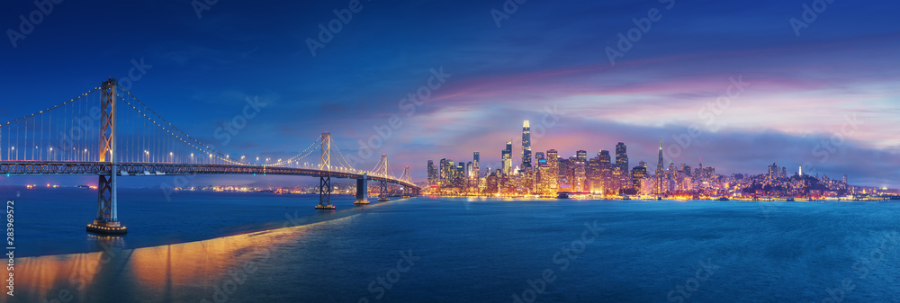 San Francisco Bay Bridge and San Francisco downtown in wide panorama photo