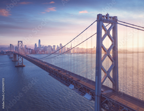 San Francisco Bay Bridge with San Francisco downtown in background photo