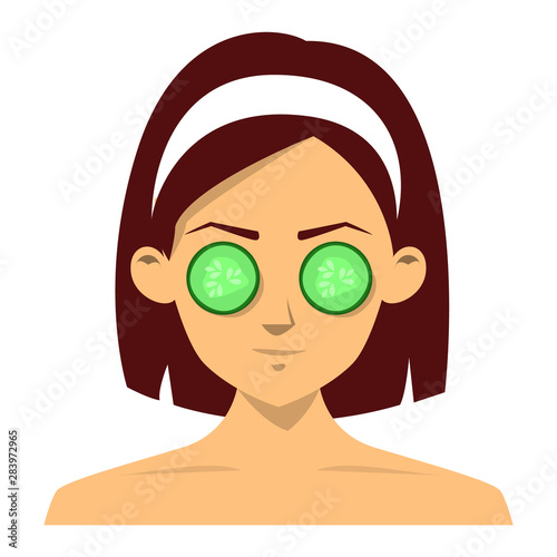 Cute beautiful woman face with cucumber mask on eyes