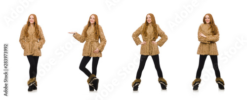 Redhead girl in fur coat isolated on white