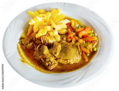 Image of baked pork cheeks in sauce with potatoes and vegetables