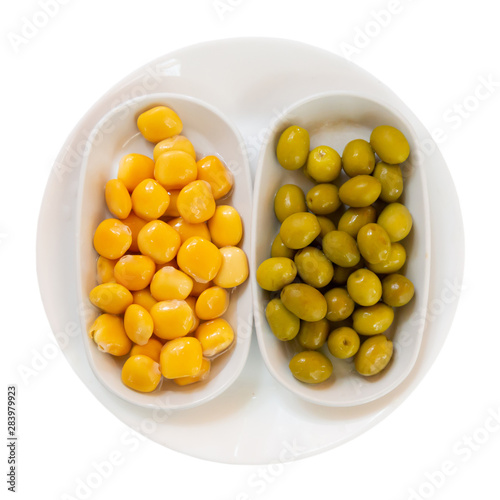 Top view of green olives and pickled lupini beans