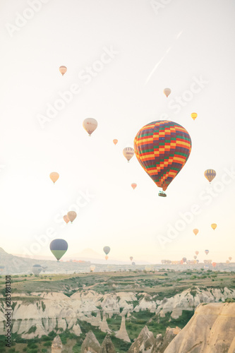Panoramic view. Colorful hot air balloons flying over the valley at Cappadocia