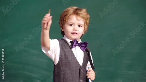 Learning concept. School children in uniform. Teacher in classroom. Teacher and student. Back to school. Classmate Educate Friend Knowledge Lesson Concept. Early Childhood Education, Playing Concept. photo