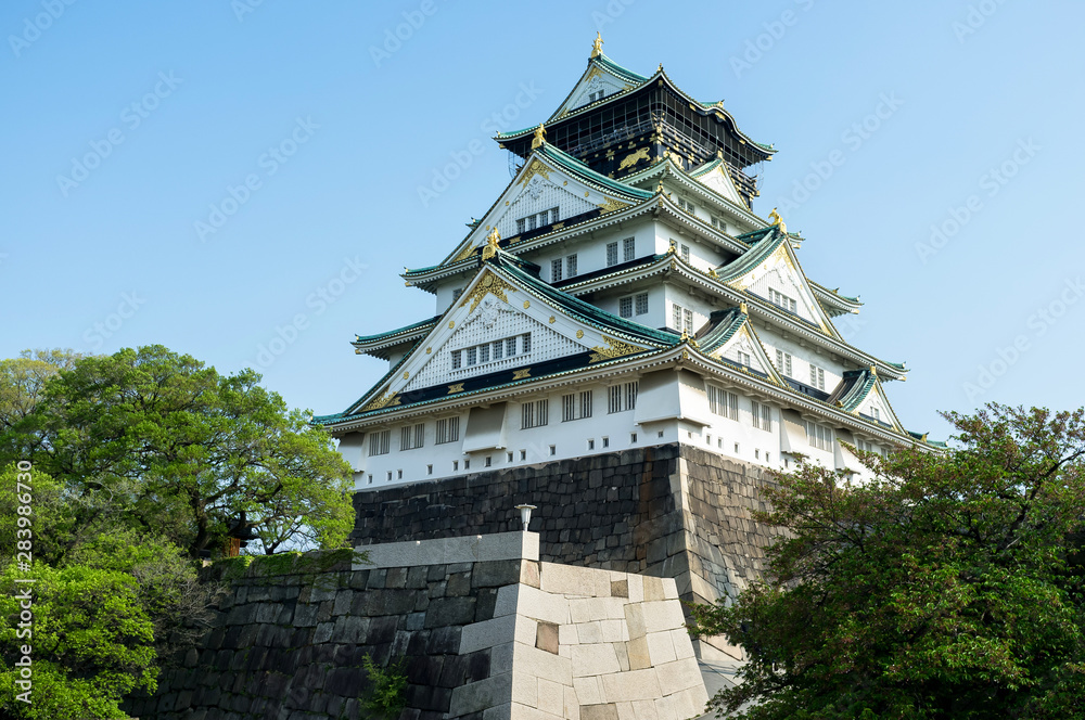 Low angle view of Osaka castle against clear sky during sunset Low angle view of Osaka castle against clear sky during sunset