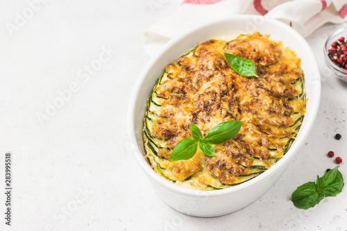 Zucchini cheesy casserole.Selective focus, copy space.