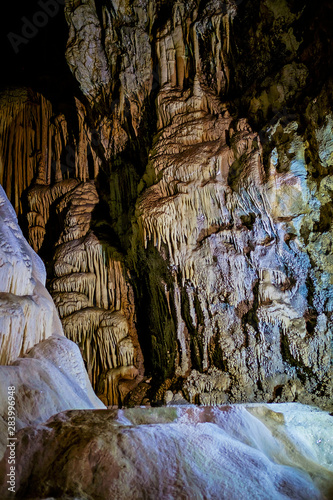 Walls covered with stalactites and stalagmites inside the cave 5 photo