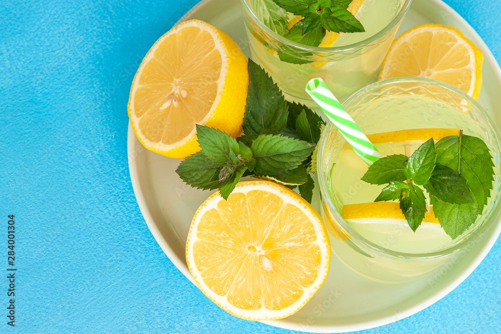 Lemonade or mojito cocktail with lemon and mint Lemonade or mojito cocktail with lemon and mint