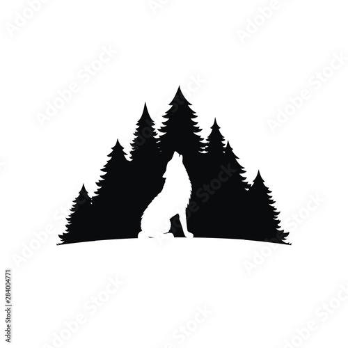 Wolf silhouette on forest background