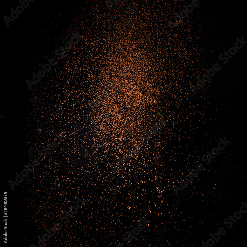 Wallpaper Mural Cocoa powder sifting isolated on black background. Chocolate dust on black background Torontodigital.ca