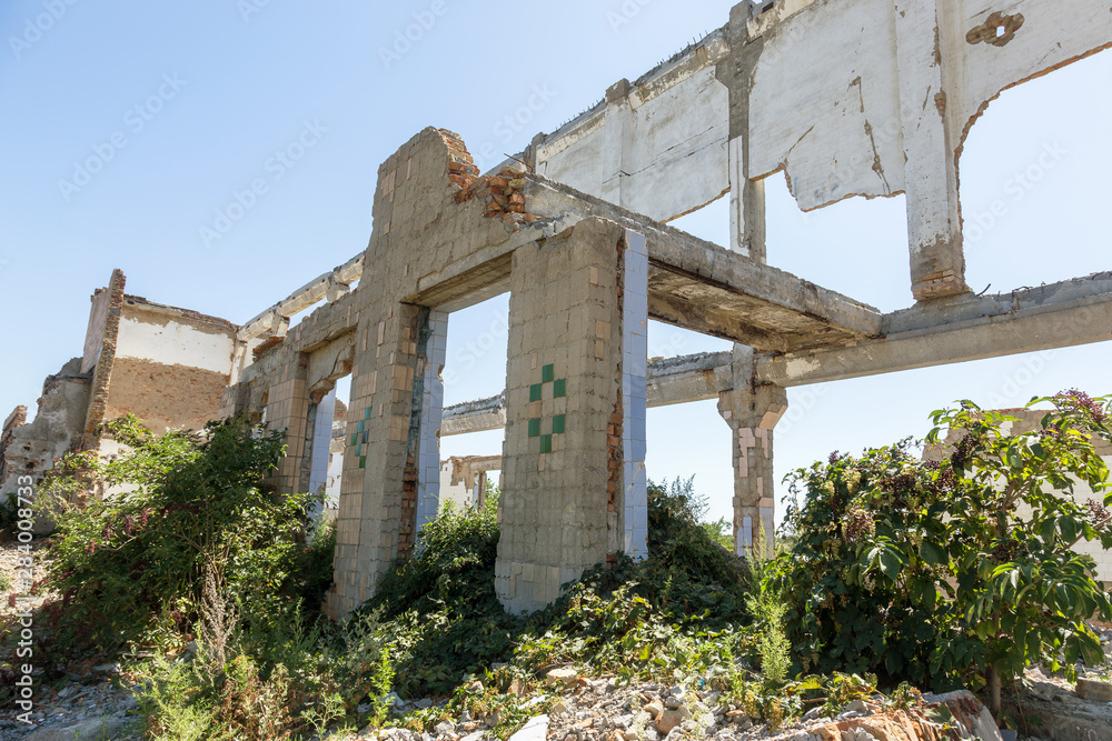 Ruined house. Remains of old houses. Apocalypse. Abandoned city. City of ghosts. Ruins of old historic houses destroyed by an earthquake and devastating operation of urban structures. Broken building Ruined house. Remains of old houses. Apocalypse. Abandoned city. City of ghosts. Ruins of old historic houses destroyed by an earthquake and devastating operation of urban structures. Broken building