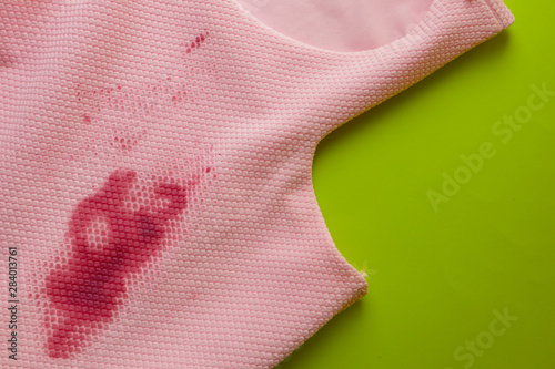 Dirty dress on color background