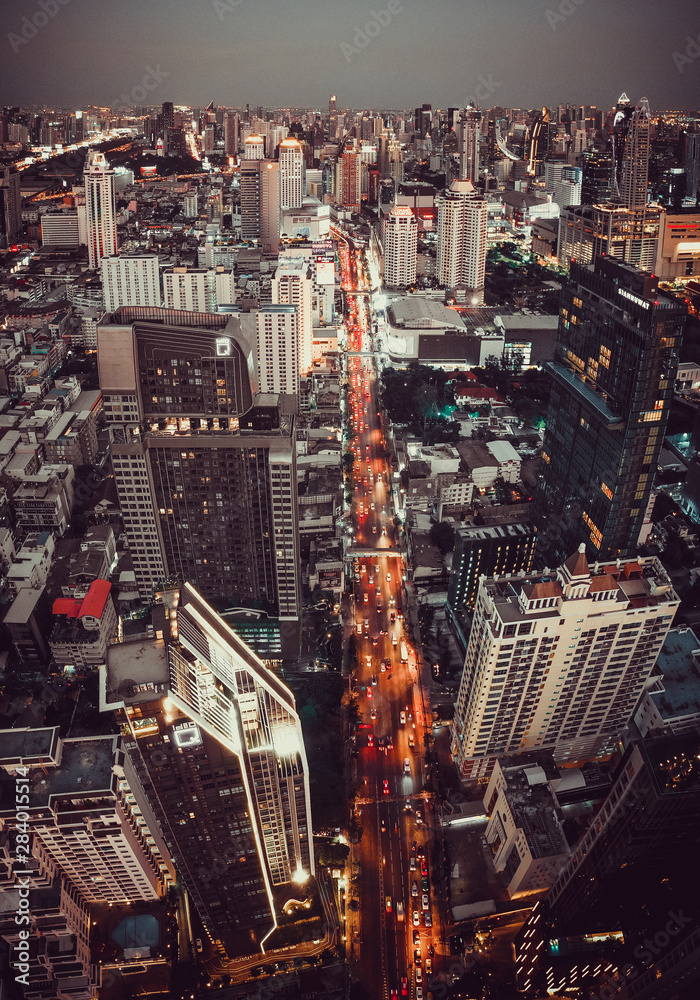 Fototapeta premium Siam and Rachathewi views from above by night in Bangkok Thailand