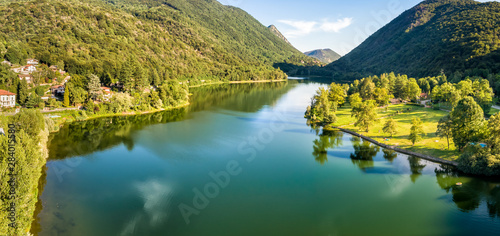 Panoramic view of Ghirla Lake in the summer afternoon  Varese  Italy