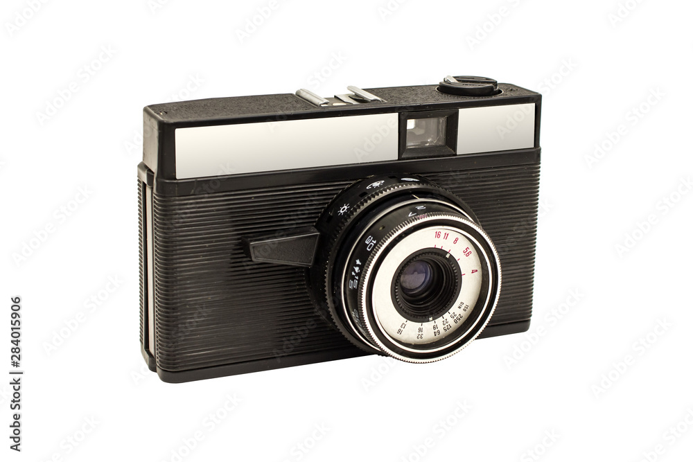 Old film camera on an isolated white background. Old film camera on an isolated white background.