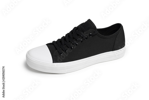 Classic sneakers on a white background side view.