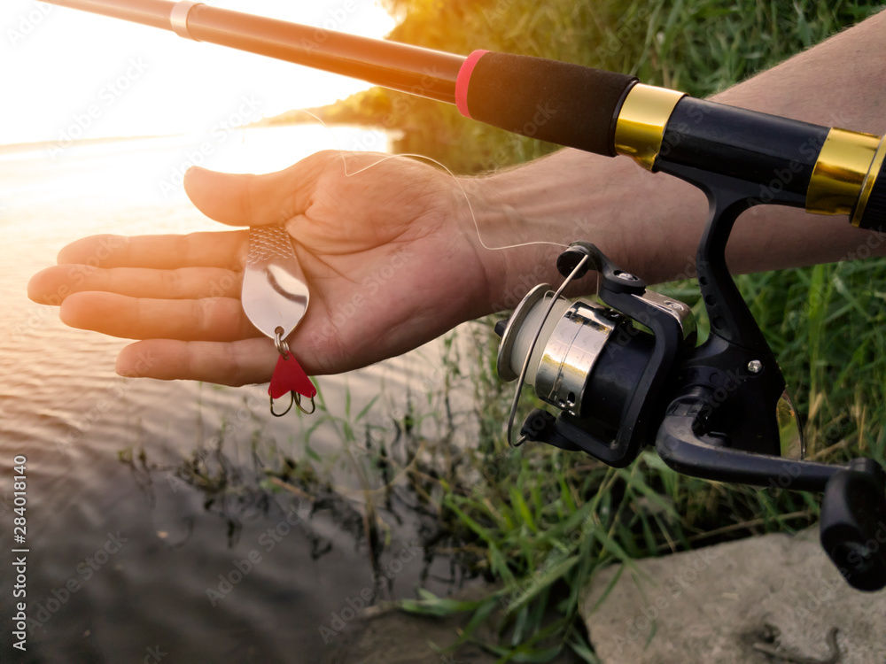 fishing on the river at sunset fishing on the river at sunset