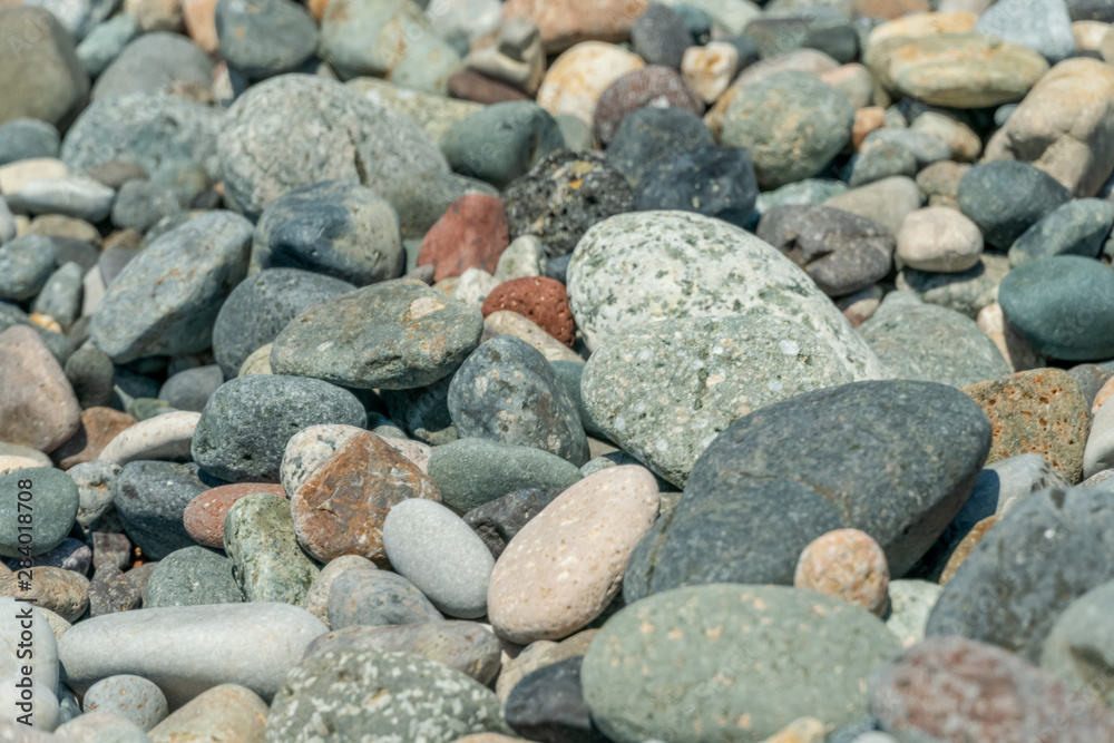Nice background image of big pebbles on a beach Nice background image of big pebbles on a beach