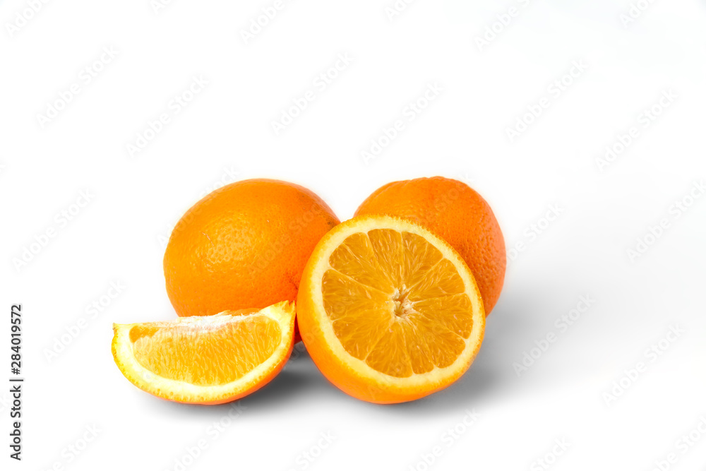 Sliced oranges fruit segments isolated on white background