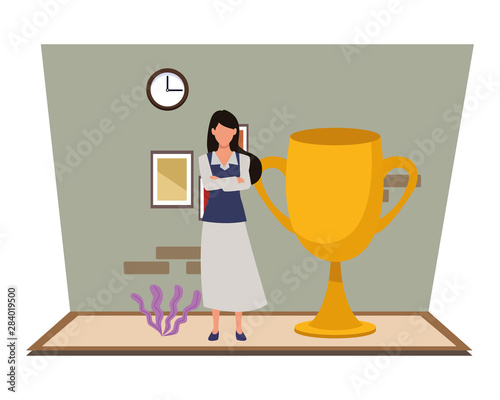 Executive businesswoman with big trophy cup
