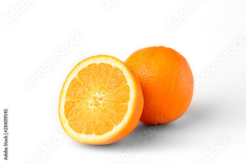 Sliced oranges fruit segments isolated on white background